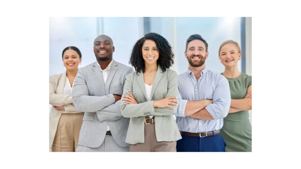 A team of recruitment professionals from EAN Consultants standing together in an office